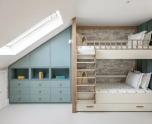 barnes loft refurbishment showing bespoke cabinetry and bunkbeds built-in to fit loft roof slope