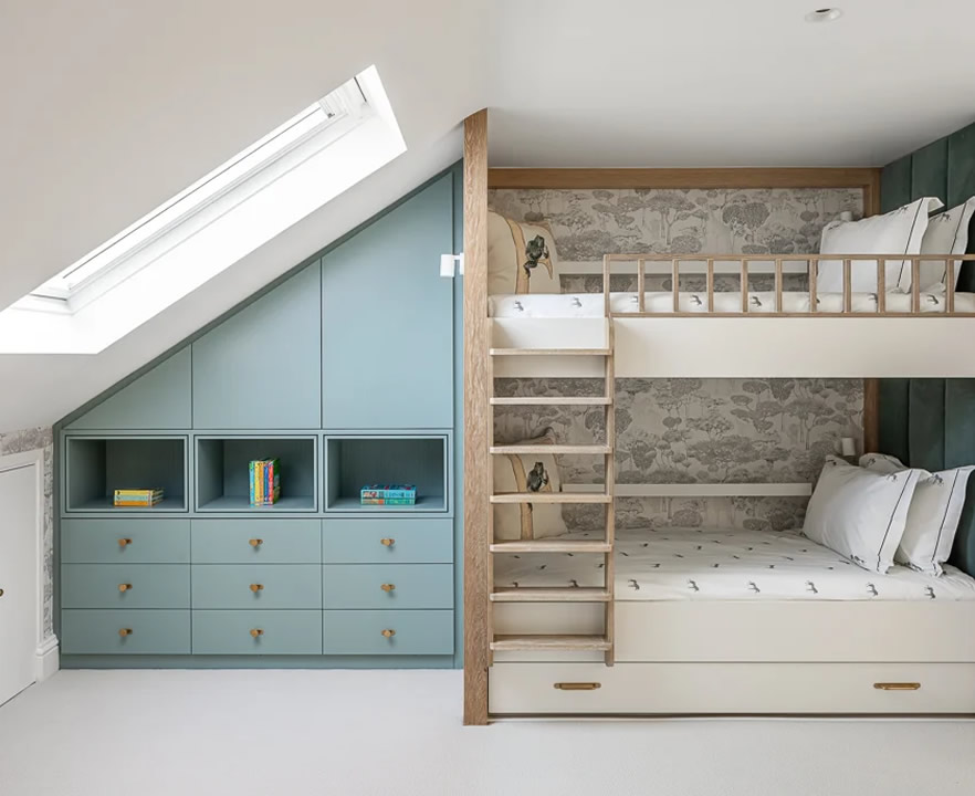 barnes loft refurbishment showing bespoke cabinetry and bunkbeds built-in to fit loft roof slope